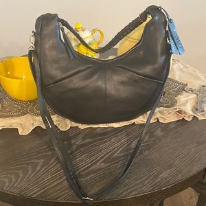 Beautiful black leather shoulder bag. Italian brand leather purse.